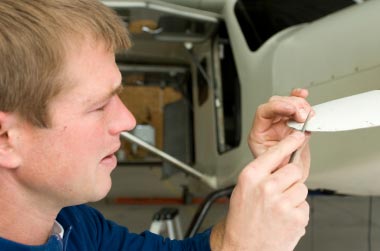 Mechanic working on a plane